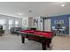 Spacious game room with a pool table and foosball table at 8892 Bengal Ct, Kissimmee, FL 34747