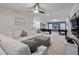Spacious game room with a large sofa and pool table at 8892 Bengal Ct, Kissimmee, FL 34747