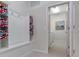 Mud room including towels and a doorway to the laundry room at 8892 Bengal Ct, Kissimmee, FL 34747