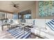 Inviting covered patio area with comfortable seating and stylish decor at 8892 Bengal Ct, Kissimmee, FL 34747