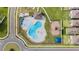 Aerial view of the community pool and playground at 903 Sydney St, Davenport, FL 33837
