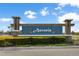 Entrance sign for the community of Astoria with manicured landscaping at 903 Sydney St, Davenport, FL 33837