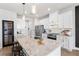Spacious kitchen with a large island, stainless steel appliances, and a modern design at 903 Sydney St, Davenport, FL 33837