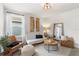 Inviting living room with ample natural light, modern furnishings, and tasteful decor at 903 Sydney St, Davenport, FL 33837