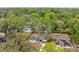 Aerial view of the property highlighting its location within a lush, green neighborhood at 239 S Lake Cortez Dr, Apopka, FL 32703