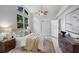 Bright bedroom with a ceiling fan and lots of natural light at 239 S Lake Cortez Dr, Apopka, FL 32703