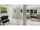 Open concept living room with bright windows at 239 S Lake Cortez Dr, Apopka, FL 32703