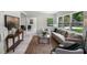 Spacious living room with new laminate floors and fireplace at 239 S Lake Cortez Dr, Apopka, FL 32703