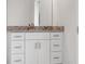 Bathroom features a vanity with modern fixtures and granite countertop at 239 S Lake Cortez Dr, Apopka, FL 32703