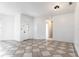 View of the living room with tile floors and white walls at 321 Moffat Loop, Oviedo, FL 32765