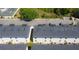 Aerial view of townhome community with well-maintained roofs and landscaping at 3296 Tranquil Trl, Kissimmee, FL 34747