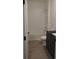 Bright bathroom with tub and shower combo plus modern vanity at 3296 Tranquil Trl, Kissimmee, FL 34747