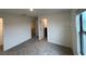 Bright carpeted bedroom with closet and window with plenty of natural light at 3296 Tranquil Trl, Kissimmee, FL 34747