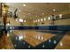Indoor basketball court featuring hardwood floors and multiple hoops at 3344 Corona Village Way # B4, Orlando, FL 32835