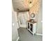 Bathroom featuring an ornate mirror, a tub with shower, and decorative cabinets at 3344 Corona Village Way # B4, Orlando, FL 32835