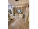 Eat-in kitchen and dining space has updated floors and a decorative buffet at 3344 Corona Village Way # B4, Orlando, FL 32835