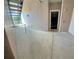 Inviting condo entrance with a black door and stair access at 3344 Corona Village Way # B4, Orlando, FL 32835