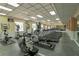 Well-equipped gym featuring cardio machines and mirrored walls at 3344 Corona Village Way # B4, Orlando, FL 32835