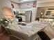 Bright kitchen with stainless steel appliances, white cabinets, and granite countertops at 3344 Corona Village Way # B4, Orlando, FL 32835