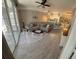 Relaxing living room with neutral décor and sliding doors to a screened in patio at 3344 Corona Village Way # B4, Orlando, FL 32835