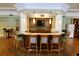 Community lounge showcasing a stylish bar with TV, seating, and a light, airy atmosphere at 3344 Corona Village Way # B4, Orlando, FL 32835