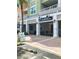 Exterior of the Time Square Marketplace featuring covered entry and visible signage at 3344 Corona Village Way # B4, Orlando, FL 32835