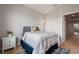 Bedroom with a bed and a large window with a view and a closet at 1969 Portofino Meadows Blvd, Orlando, FL 32824