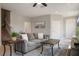 Inviting living room with neutral walls, tile floors, and an open staircase at 1969 Portofino Meadows Blvd, Orlando, FL 32824
