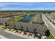 Aerial view featuring pond, playground and convenient parking at 4730 Coral Castle Dr, Kissimmee, FL 34746
