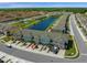 Townhouse community with pond and easy access to parking at 4730 Coral Castle Dr, Kissimmee, FL 34746