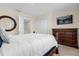 Comfortable bedroom featuring closet, television and dresser at 4730 Coral Castle Dr, Kissimmee, FL 34746