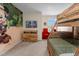 Themed bedroom featuring bunk bed, desk, chair, and television at 4730 Coral Castle Dr, Kissimmee, FL 34746