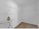 Walk-in closet with wire shelving and space for an ironing board at 4730 Coral Castle Dr, Kissimmee, FL 34746