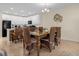 Dining room with elegant table setting and wicker chairs at 4730 Coral Castle Dr, Kissimmee, FL 34746