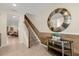 Inviting hallway with staircase and stylish decor at 4730 Coral Castle Dr, Kissimmee, FL 34746