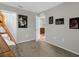View of bedroom with bunkbed, Star Wars art, carpet, and a door to the hallway at 4732 Coral Castle Dr, Kissimmee, FL 34746