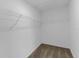 Walk-in closet with wire shelving for ample storage at 4732 Coral Castle Dr, Kissimmee, FL 34746
