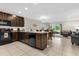 Open kitchen flows into dining and living area, providing ample space at 4732 Coral Castle Dr, Kissimmee, FL 34746