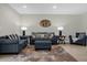 Cozy living room features neutral tones and coordinated furniture at 4732 Coral Castle Dr, Kissimmee, FL 34746