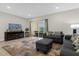 Inviting living room with sliding glass doors and a view of the outdoors at 4732 Coral Castle Dr, Kissimmee, FL 34746