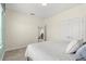 Clean bedroom with carpet flooring, double door closet and views to the hallway at 8896 Reymont St, Orlando, FL 32827