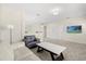 Cozy upstairs bonus room with neutral decor and a relaxing atmosphere at 8896 Reymont St, Orlando, FL 32827