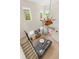 Bright living room featuring high ceilings, a ceiling fan, and a large gray couch at 8896 Reymont St, Orlando, FL 32827