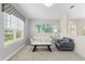 Comfortable sitting area with a neutral color scheme and plenty of natural light at 8896 Reymont St, Orlando, FL 32827
