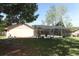 Large backyard featuring a screened-in pool at 1157 Duncan Dr, Winter Springs, FL 32708