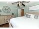 Bedroom features a spacious layout, wooden floors, and a decorative wall piece at 1157 Duncan Dr, Winter Springs, FL 32708
