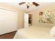 Bedroom featuring a spacious layout, wooden floors, and a closet at 1157 Duncan Dr, Winter Springs, FL 32708