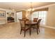Cozy dining room with chandelier and comfortable seating, perfect for gatherings and meals at 1157 Duncan Dr, Winter Springs, FL 32708