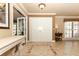 Elegant foyer with tiled floor and natural light, creating a grand entry to the home at 1157 Duncan Dr, Winter Springs, FL 32708