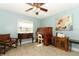 A cozy home office featuring a vintage roll-top desk and an array of decor at 1157 Duncan Dr, Winter Springs, FL 32708